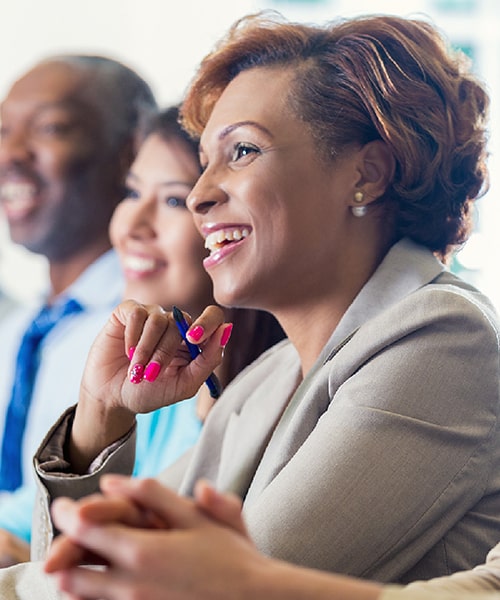 Female business women in classroom.