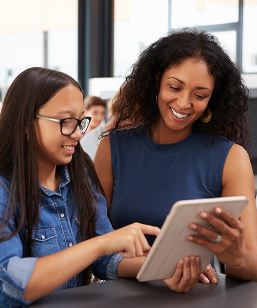 Teacher meets with middle school student