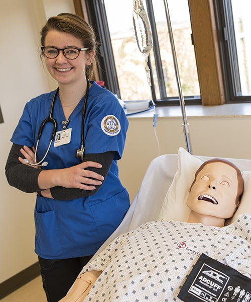 Female student in a simulation lab.