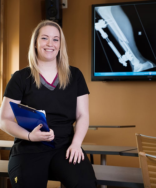 Female student in Radiologic Technology classroom.