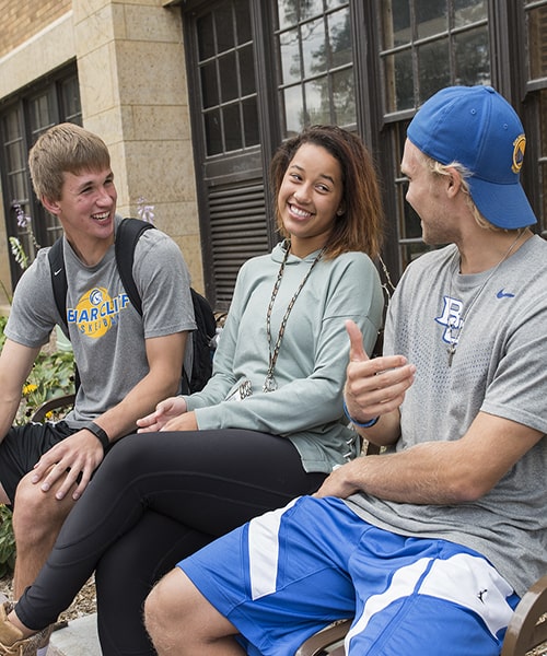 Students talking in the Prayer and Reflection Garden.